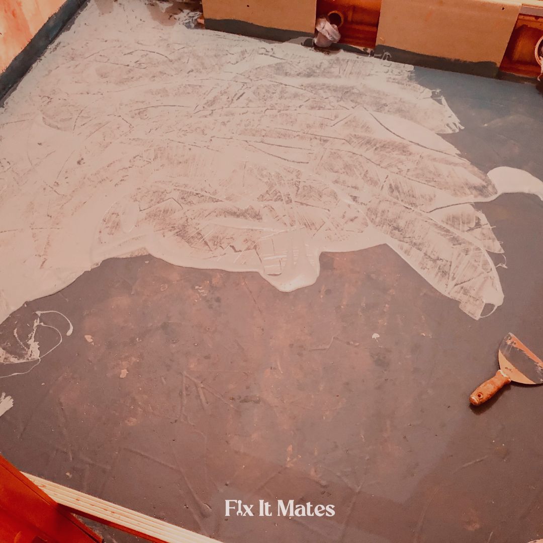 Bathroom waterproofing application by Fix It Mates, featuring a waterproof membrane installed on shower walls and floors to prevent water penetration and mold growth.