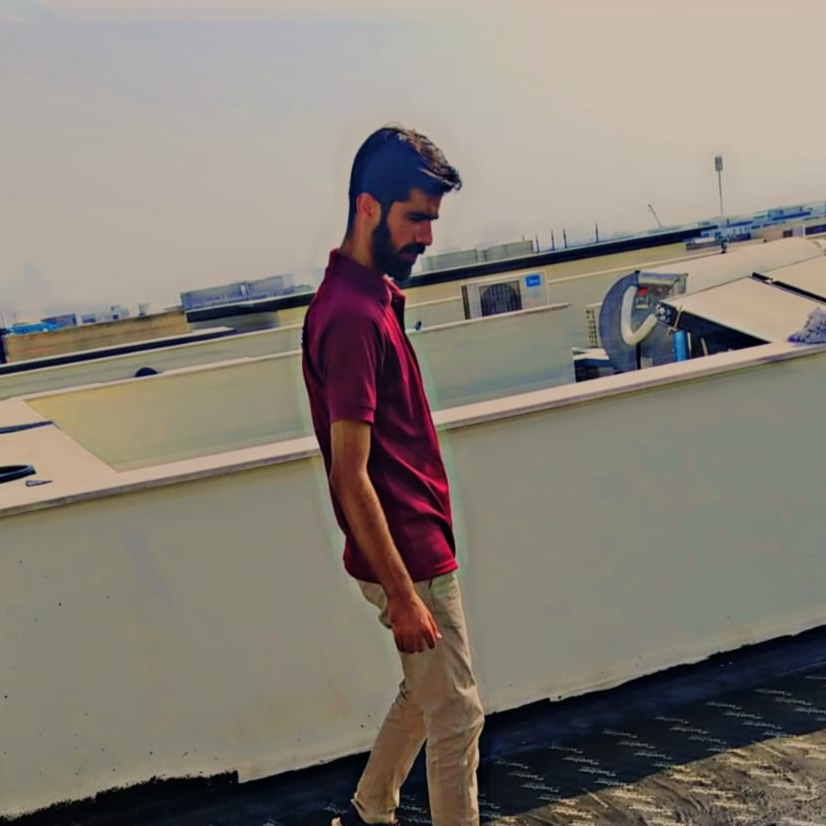 Fix It Mates team member inspecting a roof waterproofing system, ensuring proper installation and performance to prevent water leaks and damage